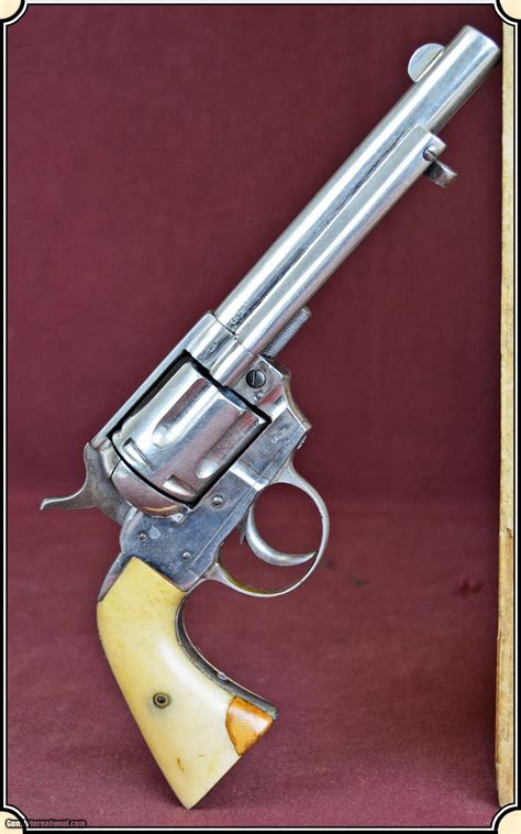 This gun was refinished long ago and retains approximately 70 of the nickel finish. . 1877 colt lightning replica